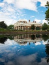 Beautiful Jefferson Monticello mansion reflecting in pool with clouds hanging above on sunny day Royalty Free Stock Photo