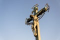 Beautiful Jesus Christ crucifixion bronze statue during sunrise, Statuary of the St. Cross with Calvary, Charles Bridge, Prague Royalty Free Stock Photo