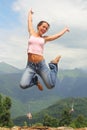 Beautiful joyful woman is jumping.