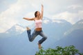 Beautiful joyful woman is jumping.