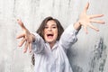 Beautiful joyful woman pulls her hands to the camera . I want hugs .