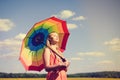 Beautiful joyful young female with rainbow Royalty Free Stock Photo