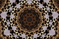 Beautiful kaleidoscopic pattern of a gold embroidery on wood Royalty Free Stock Photo