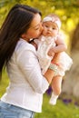 Beautiful kazakh young woman with kids