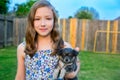 Beautiful kid girl portrait with puppy chihuahua doggy Royalty Free Stock Photo