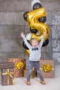 Beautiful kids, little boys celebrating birthday and blowing candles on homemade baked cake, indoor. Birthday party for Royalty Free Stock Photo