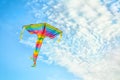 Beautiful kite flying in blue sky Royalty Free Stock Photo