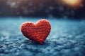 Beautiful Knitted red heart shape on background