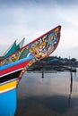 Beautiful a Kolae boat at local pier on the Bang Nara River at dusk