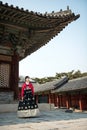 Beautiful Korean girl in Hanbok at Gyeongbokgung, the traditional Korean dress Royalty Free Stock Photo