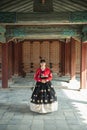 Beautiful Korean girl in Hanbok at Gyeongbokgung, the traditional Korean dress