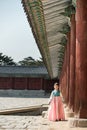 Beautiful Korean girl in Hanbok at Gyeongbokgung, the traditional Korean dress Royalty Free Stock Photo