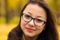 Beautiful Korean girl smiling in glasses closeup Royalty Free Stock Photo