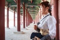 Beautiful Korean woman dressed Hanbok in Gyeongbokgung Palace in Seoul Royalty Free Stock Photo