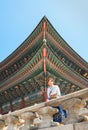 Beautiful Korean woman dressed Hanbok in Gyeongbokgung Palace in Seoul Royalty Free Stock Photo