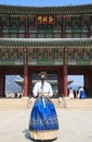 Beautiful Korean woman dressed Hanbok in Gyeongbokgung Palace in Seoul Royalty Free Stock Photo