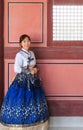 Beautiful Korean woman dressed Hanbok in Gyeongbokgung Palace in Seoul Royalty Free Stock Photo