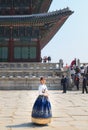 Beautiful Korean woman dressed Hanbok in Gyeongbokgung Palace in Seoul Royalty Free Stock Photo