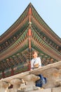 Beautiful Korean woman dressed Hanbok, Korean traditional dress, in Gyeongbokgung Palace Royalty Free Stock Photo