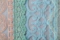 Beautiful laces on a shabby background, a textile product with an ornamental design, light transparent mesh patterned fabric Royalty Free Stock Photo