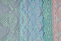 Beautiful laces on a shabby background, a textile product with an ornamental design, light transparent mesh patterned fabric Royalty Free Stock Photo