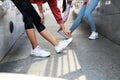 Ladies tied shoes and Asia woman exercise in the morning before running on walking street. Royalty Free Stock Photo