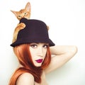 Beautiful lady with Abyssinian cat Royalty Free Stock Photo