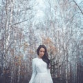 Beautiful lady in a birch forest Royalty Free Stock Photo