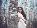 Beautiful lady in a birch forest Royalty Free Stock Photo