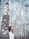 Beautiful lady in a birch forest Royalty Free Stock Photo