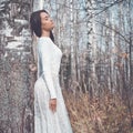 Beautiful lady in a birch forest Royalty Free Stock Photo