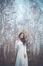 Beautiful lady in a birch forest Royalty Free Stock Photo