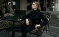 Beautiful lady in black coat Royalty Free Stock Photo