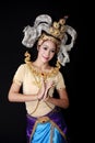 Beautiful lady dancing for original Thai dance