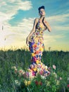 Beautiful lady in dress of flowers