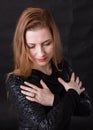 Beautiful lady with ginger hair studio portrait