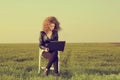 Beautiful lady with her laptop on grass Royalty Free Stock Photo