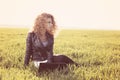 Beautiful lady with her laptop on grass Royalty Free Stock Photo