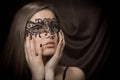 Beautiful lady in lacy black mask Royalty Free Stock Photo