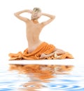 Beautiful lady with orange towels Royalty Free Stock Photo
