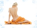 Beautiful lady with orange towels Royalty Free Stock Photo