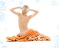 Beautiful lady with orange towels Royalty Free Stock Photo