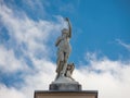 Beautiful lady statue standing alone against the cloudy blue sky at the centennial park, Sydney, Australia. Royalty Free Stock Photo