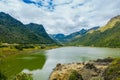 Beautiful lagoon located in Papallacta, the Andean highlands in a sunny day, with the mountains behinds in Quito Ecuador Royalty Free Stock Photo