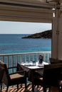 Beautiful laid table in a restaurant overlooking the mediterranean sea in sant elm, mallorca, spain