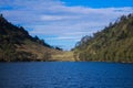 beautiful lake against the background of the blue sky - Lake Ranu Kumbolo Royalty Free Stock Photo