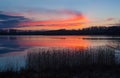 Beautiful lake with colorful sunset sky. Tranquil vibrant landscape