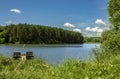 Beautiful lake and forest in the background, blue sky and white clouds