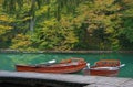 Lake in forest with boat in national park Plitvice, Croatia