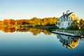 Lakehouse in Kennebunkport, Maine on placid water Royalty Free Stock Photo